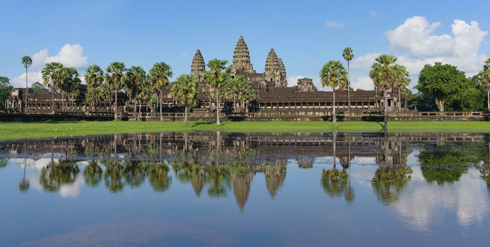 Angkor Wat temple reflected in its moat at sunrise, Siem Reap